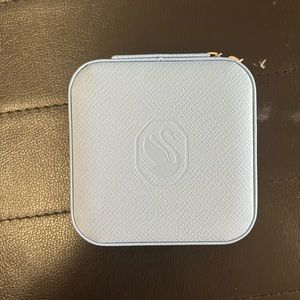 Brand new authentic Swarovski small travel jewelry case.